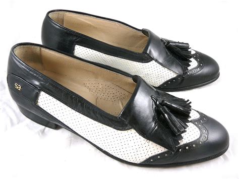 black and white vintage logo chanel spectator loafer